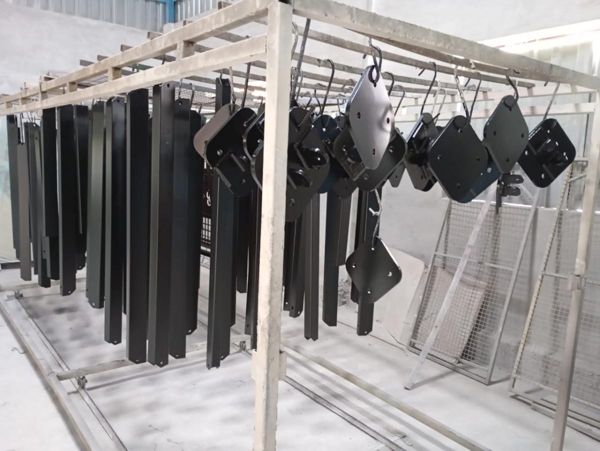 Powder coating and steel fabrication line
