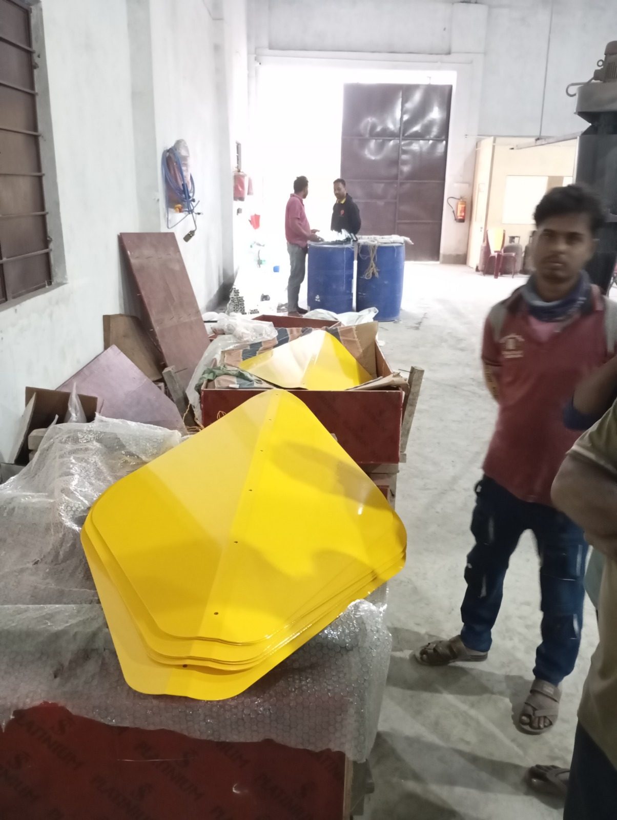 Yellow cladding panels fabricated in the workshop