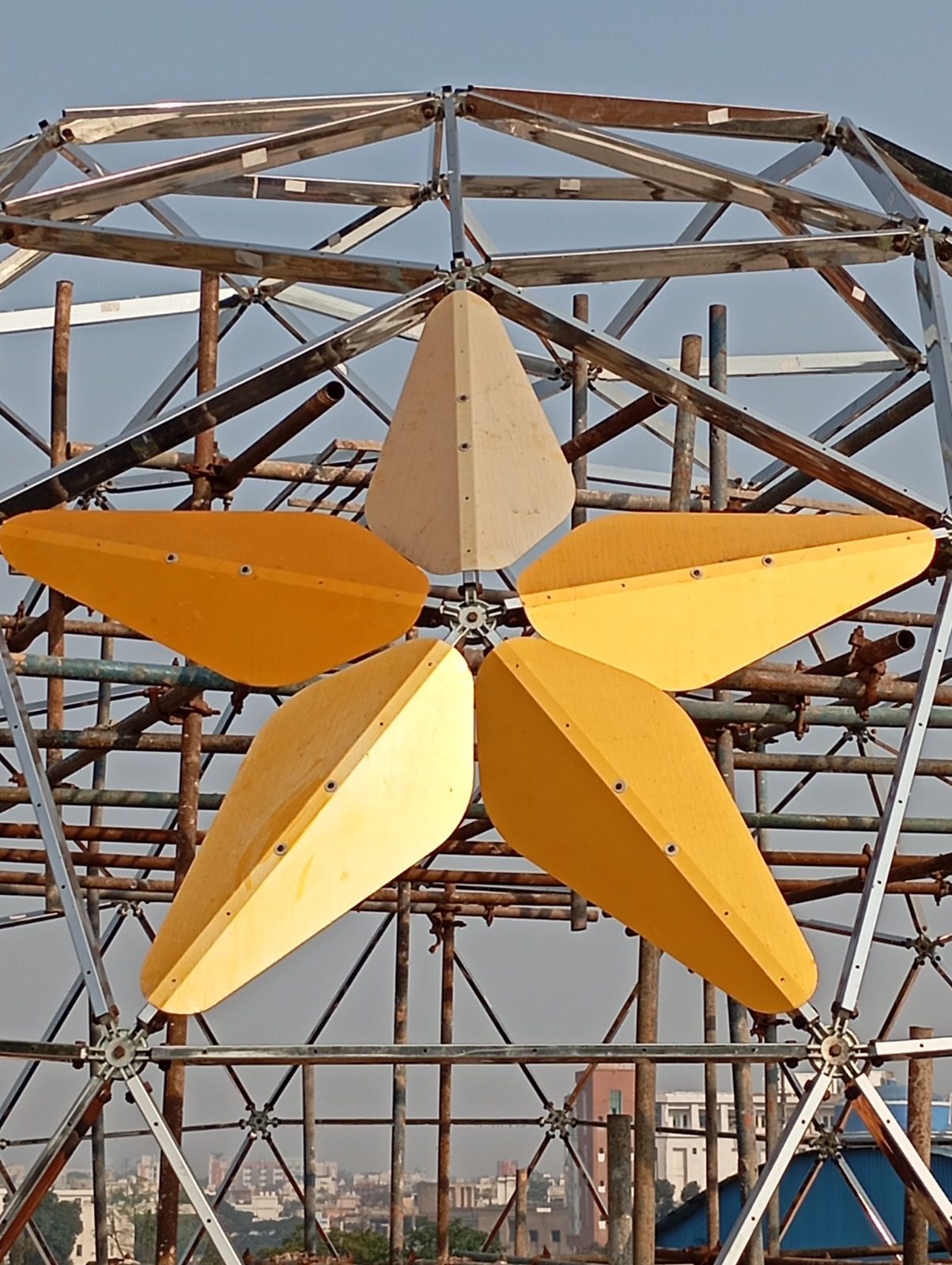 First star-pattern cladding panels fixed to the frame