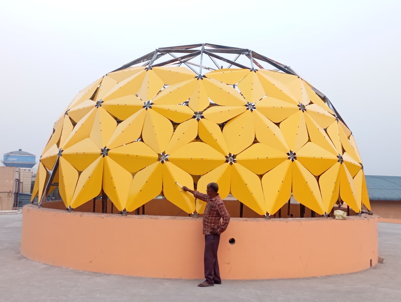 Completed yellow geodesic enclosure at Rourkela Circuit House