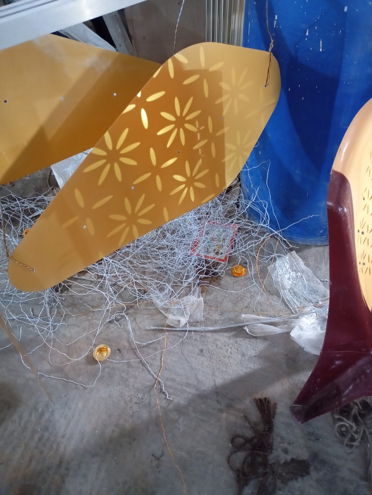 Perforated yellow cladding panels after fabrication