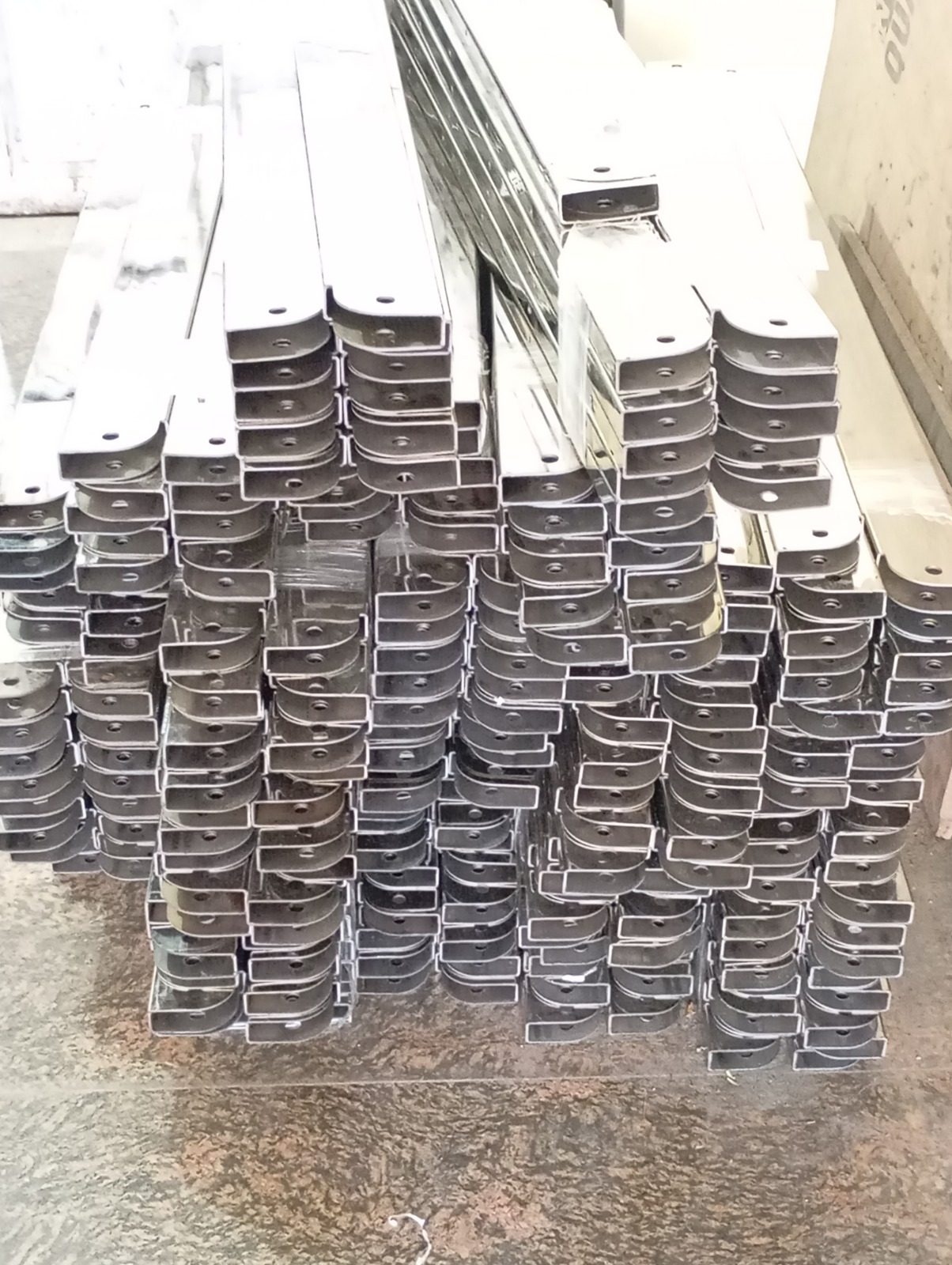 Stacked formed steel profiles ready for assembly